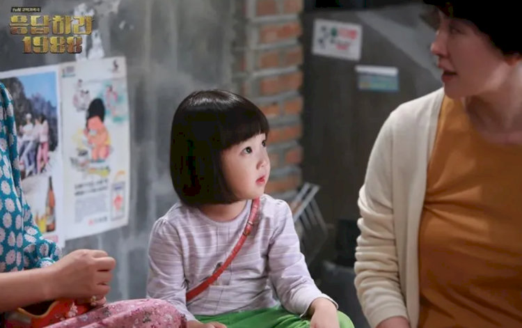 "Em út" đáng yêu của cả xóm